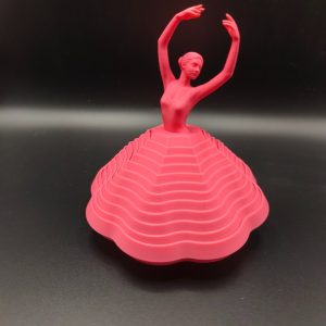 Danseuse rose sur socle tournant